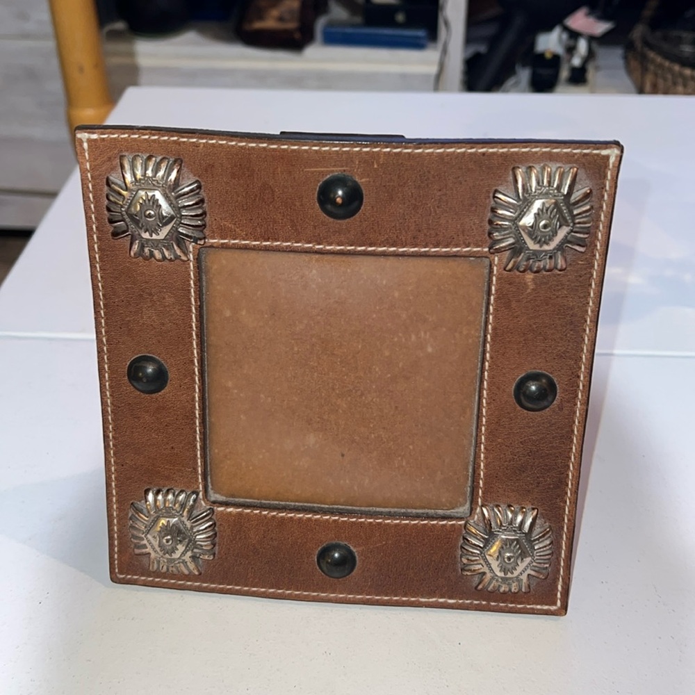 Leather studied picture frame.